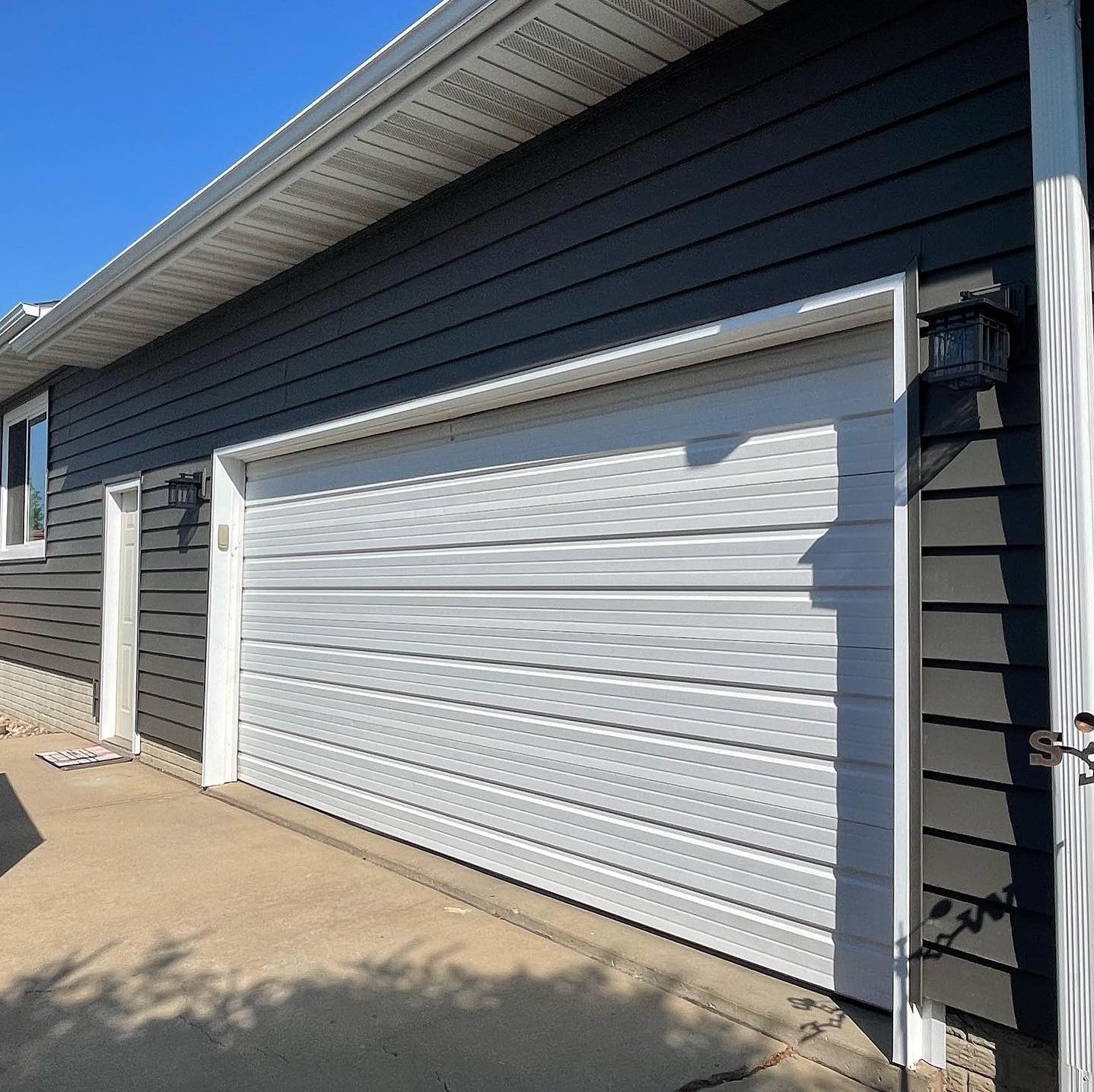 Dark grey siding — Omaha, NE — R & C Home Improvements