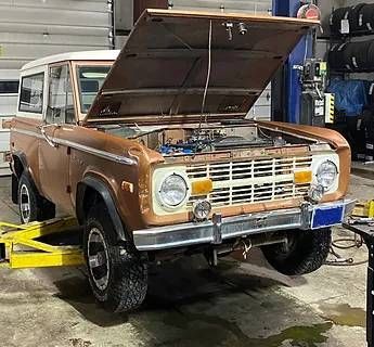 Bronco in repair in shop | Stuart's Hometown Auto