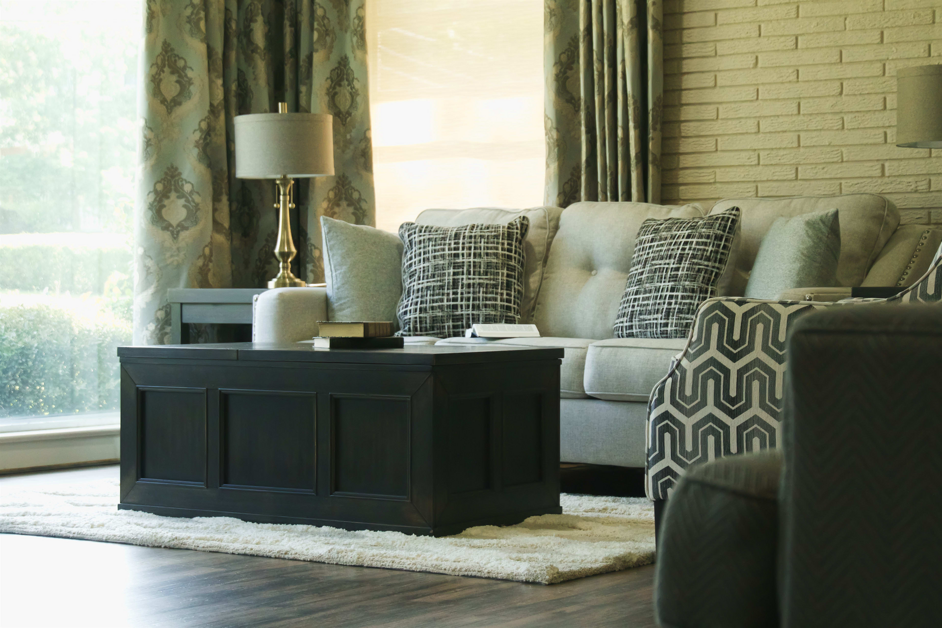 A living room with a couch and a coffee table