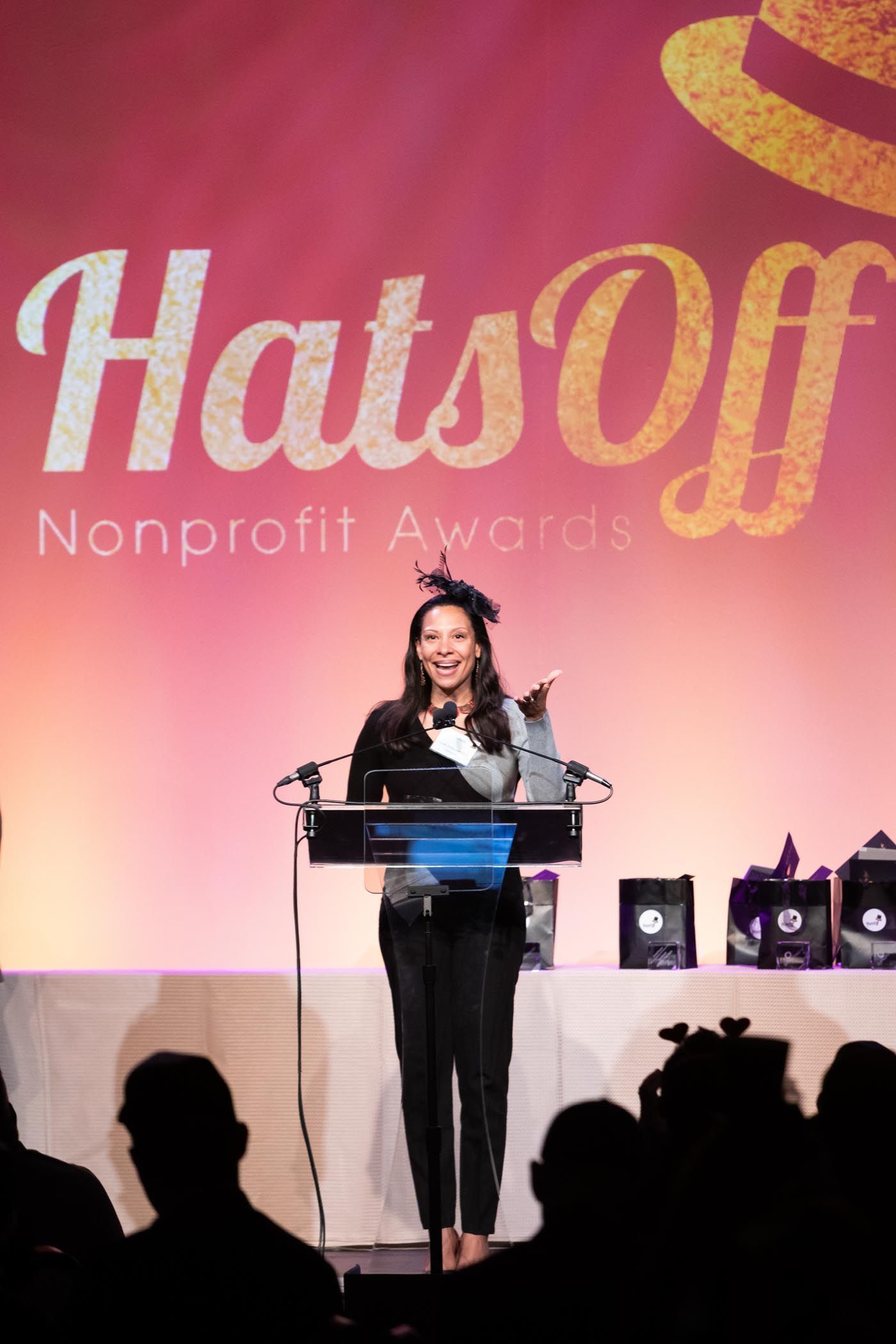 Woman at podium smiling