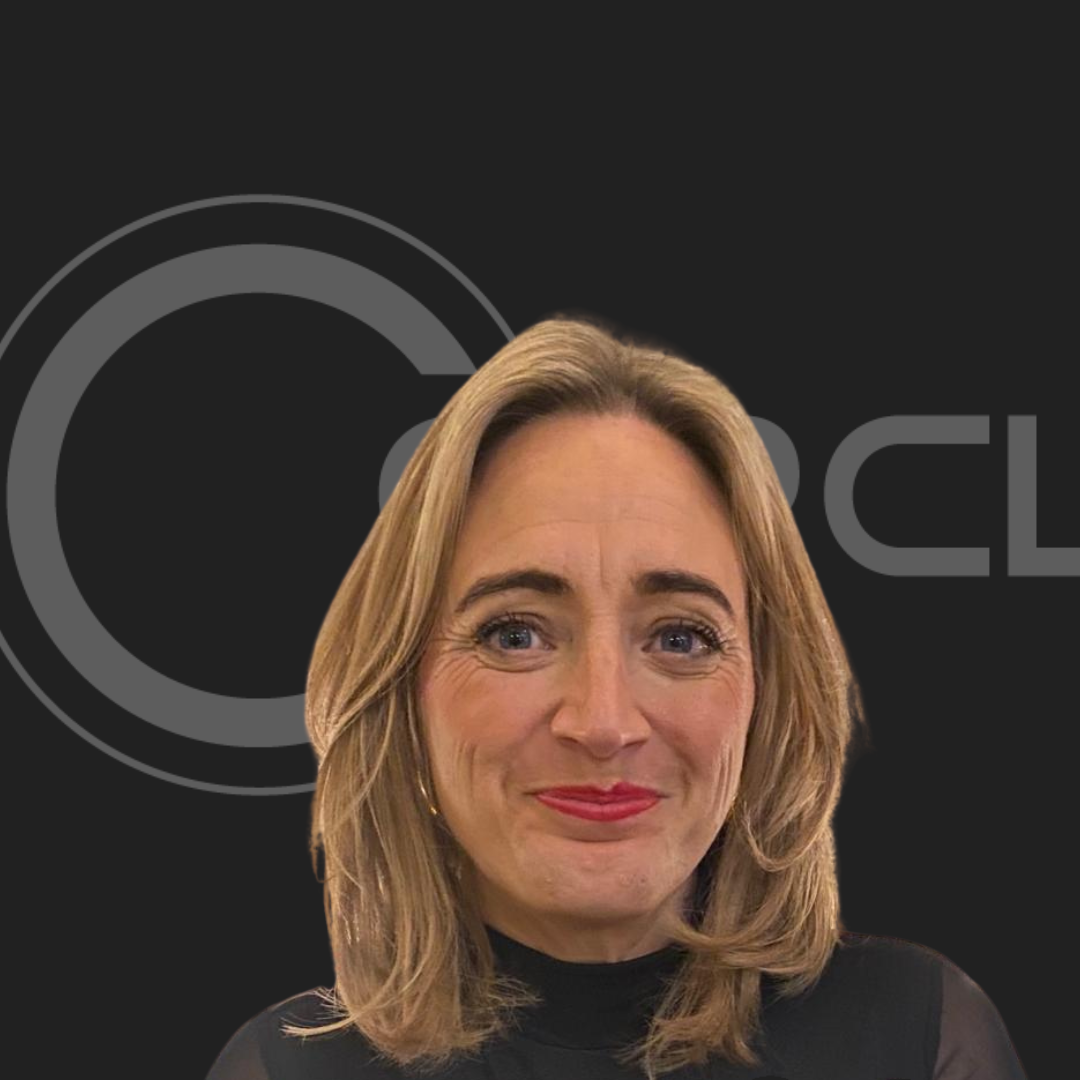 A woman is smiling in front of a logo that says cl