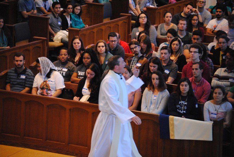 Student gather in church for retreat