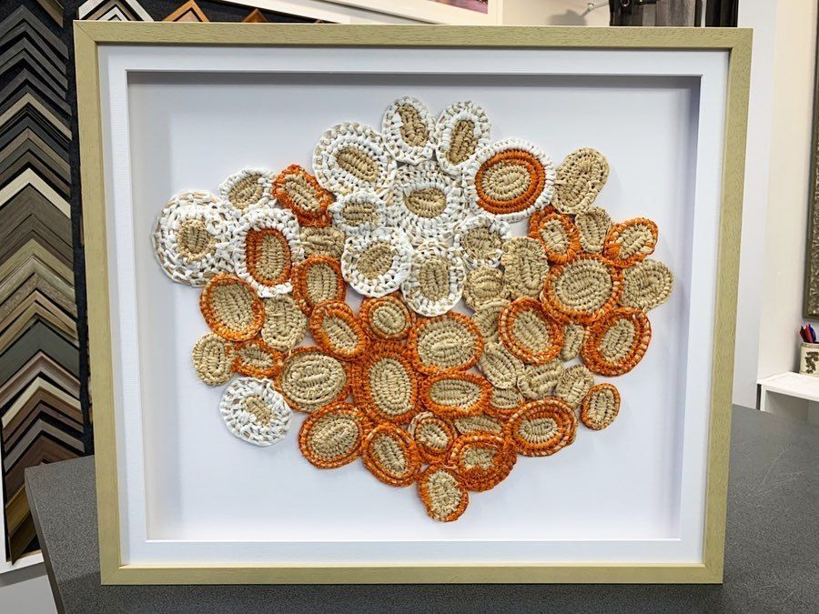 A Framed Picture of A Bunch of Circles on A Table — Framing Alternative in Woy Woy, NSW