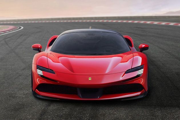 Red Ferrari on a race track 