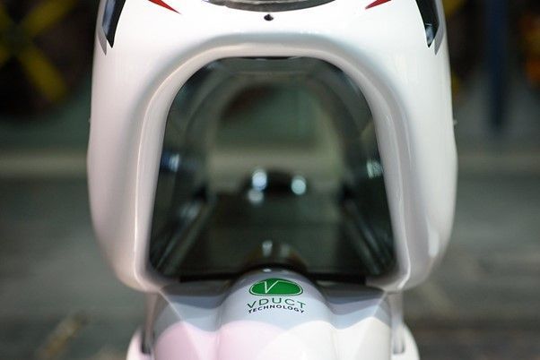 a close-up of a white electric motorbike 