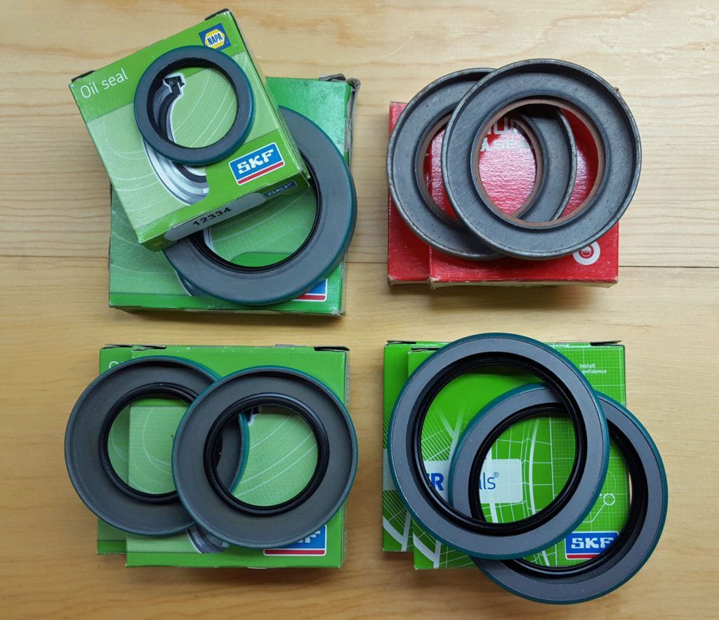 Four boxes of circular oil seals, each with two seals