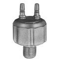 A metal pressure sensor with two top tubes and a threaded bottom.