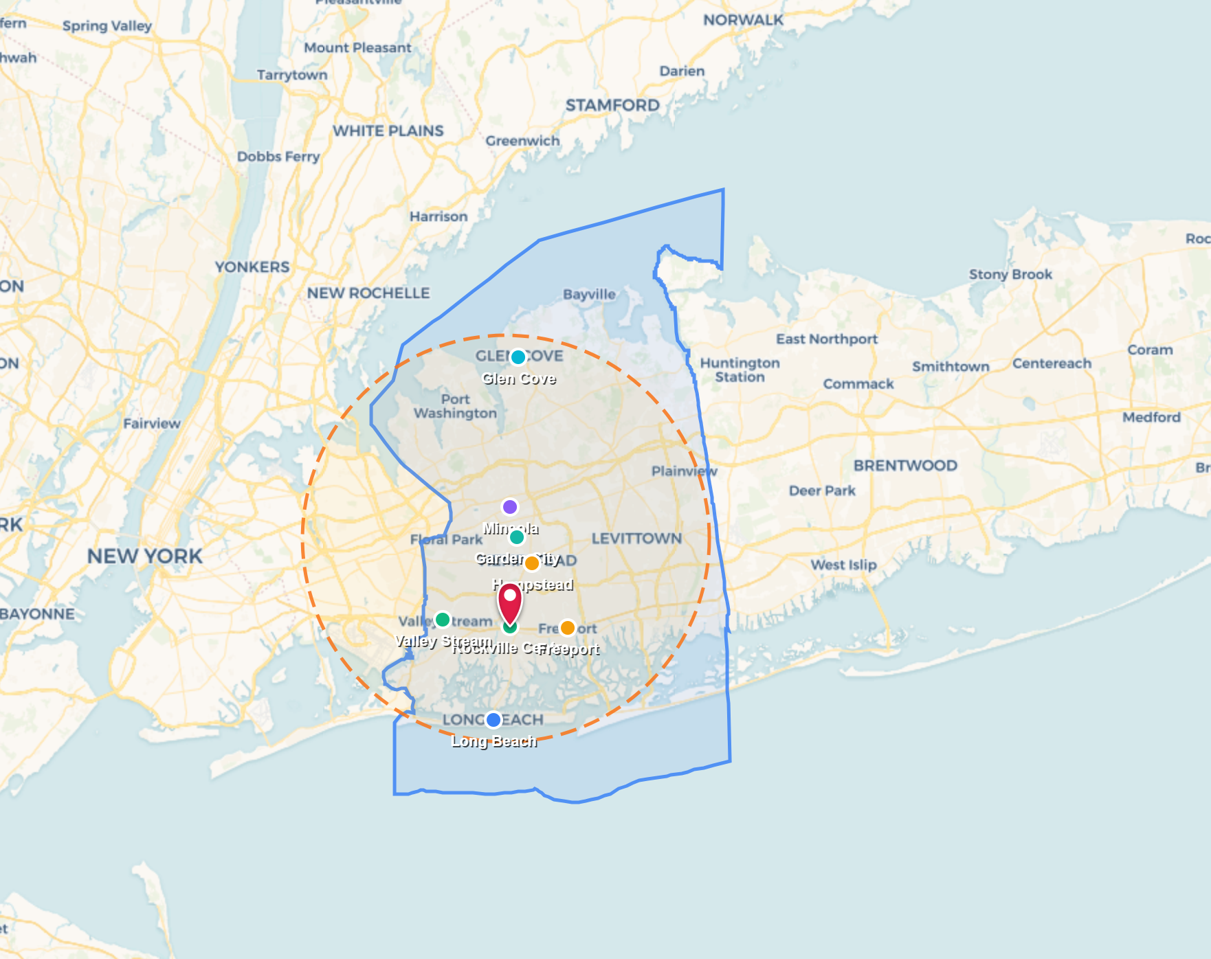 Map with a red location pin and orange radius, showing a green-outlined area over a coastal region.