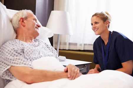Senior in bed with the nurse — Skilled Nursing in Parma, OH