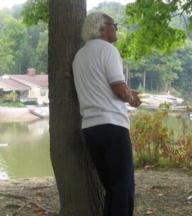 Senior beside a tree — Medication management in Parma, OH