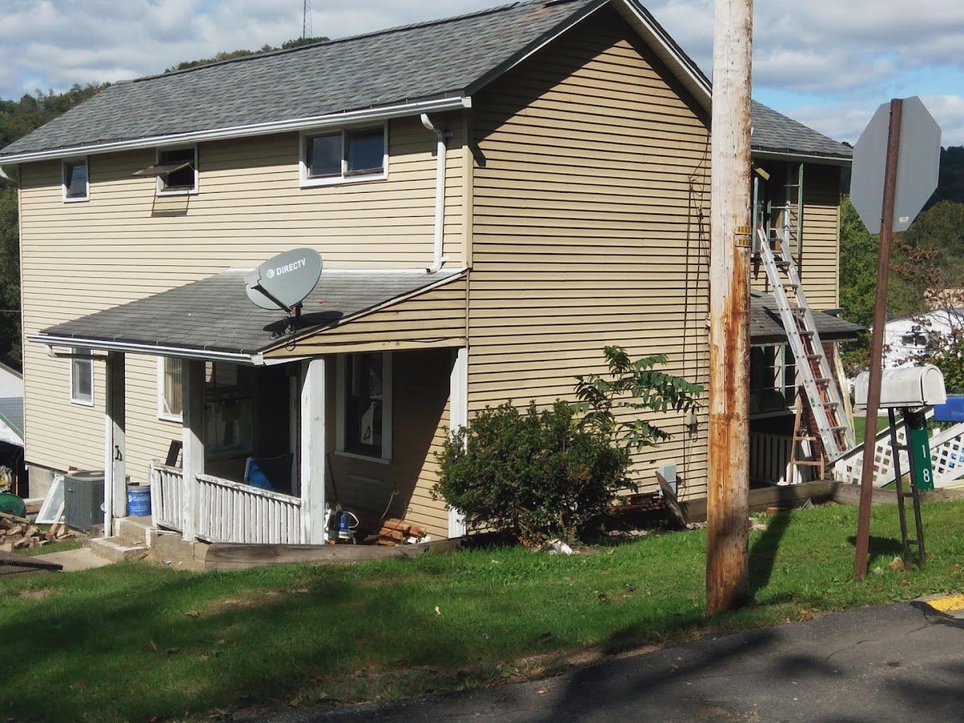 A house with a satellite dish on the roof