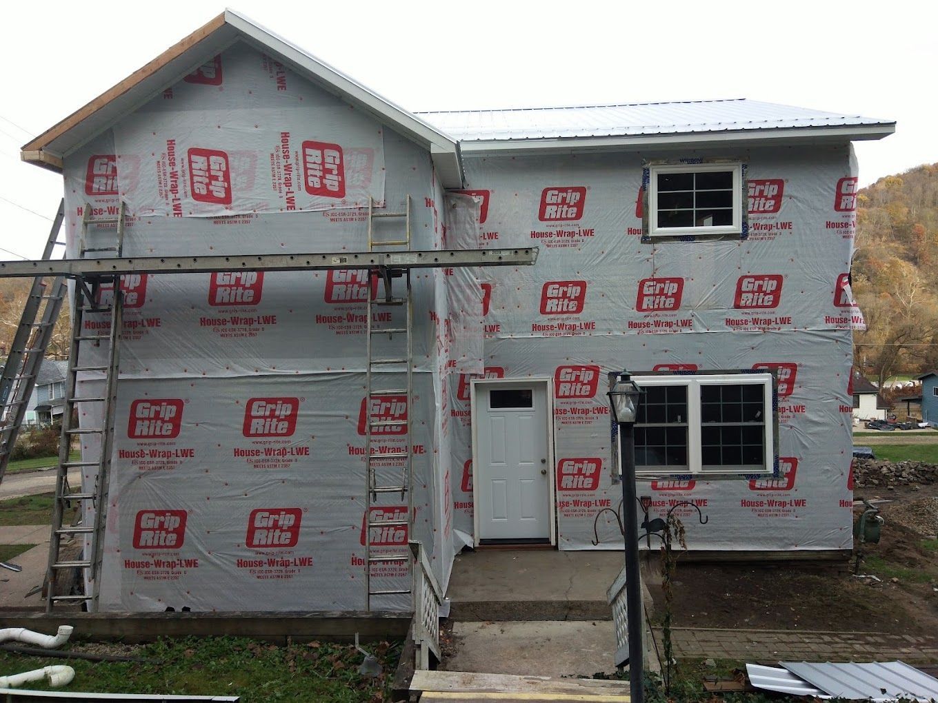 A house is being built with a lot of insulation on it.