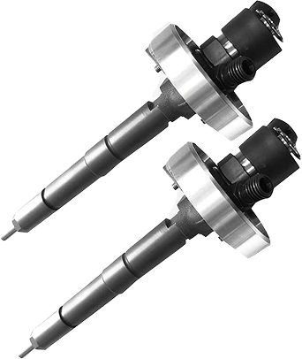 Dos inyectores de combustible diesel, metalizados con tapas negras.