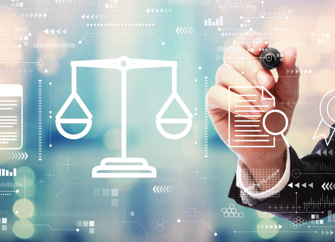 A man is drawing a scale of justice on a screen with a marker.