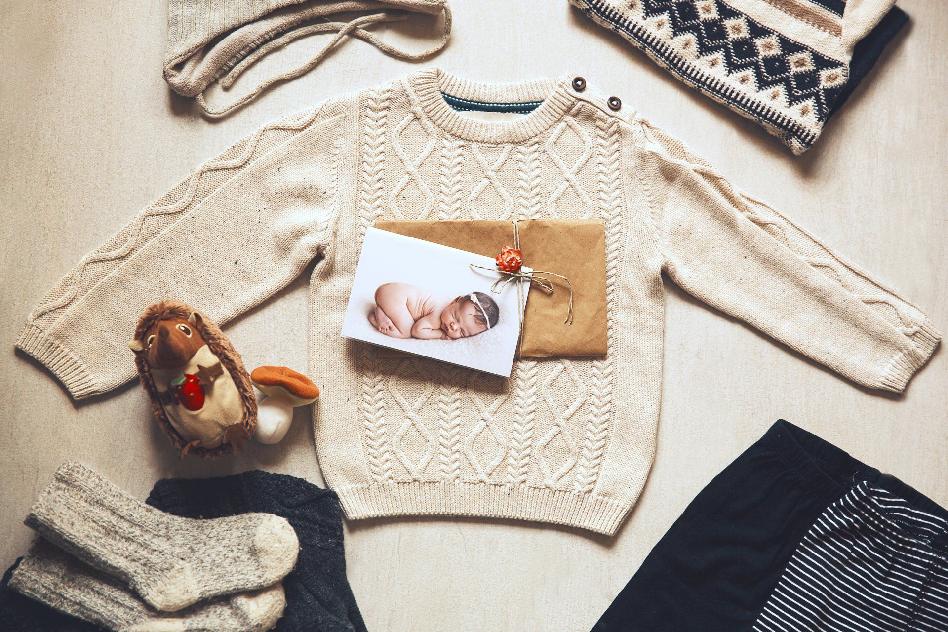 There is a picture of a baby on the sweater.