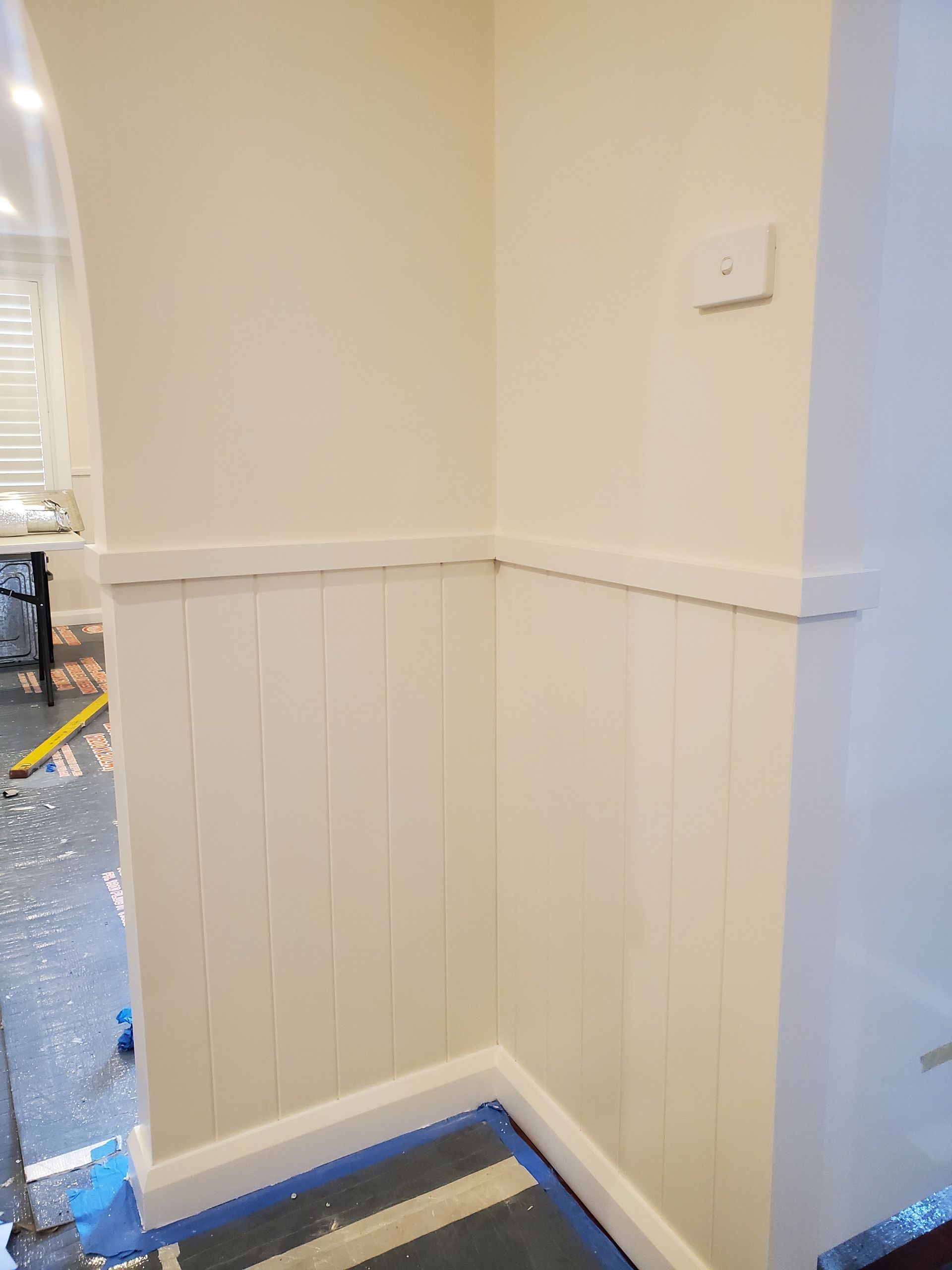 A corner of a room with white paneling on the walls — JWP Painting & Property Services in Ettalong Beach, NSW