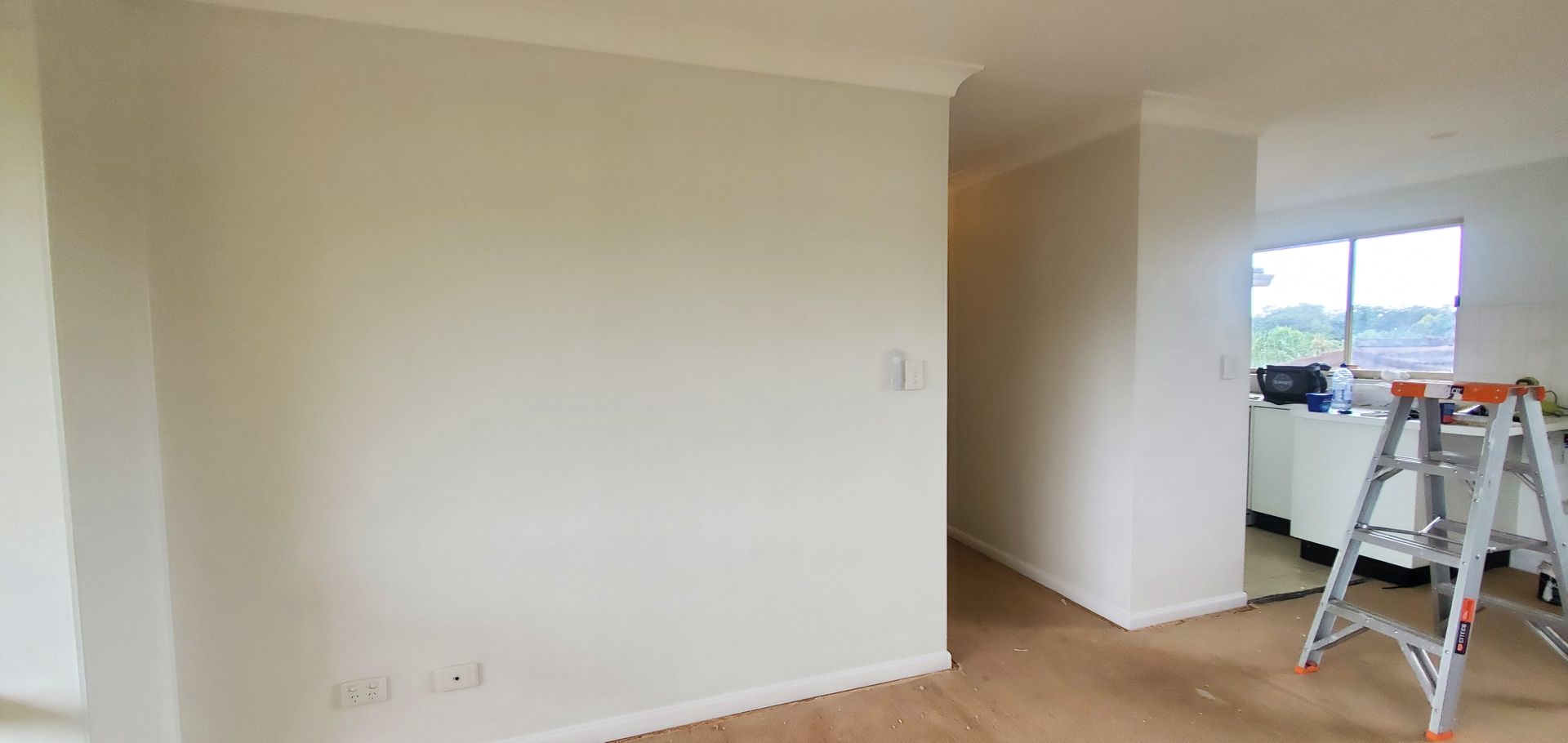 There is a ladder in the middle of the room — JWP Painting & Property Services in Ettalong Beach, NSW