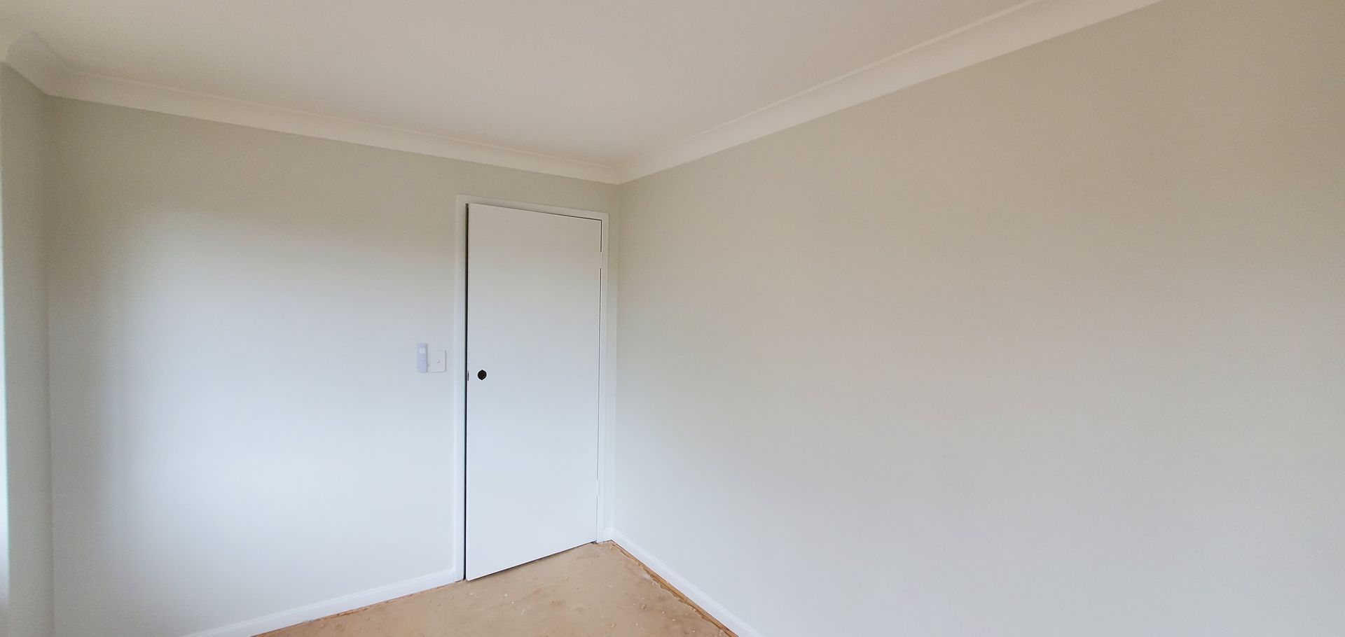 There is a door in the corner of the room — JWP Painting & Property Services in Ettalong Beach, NSW