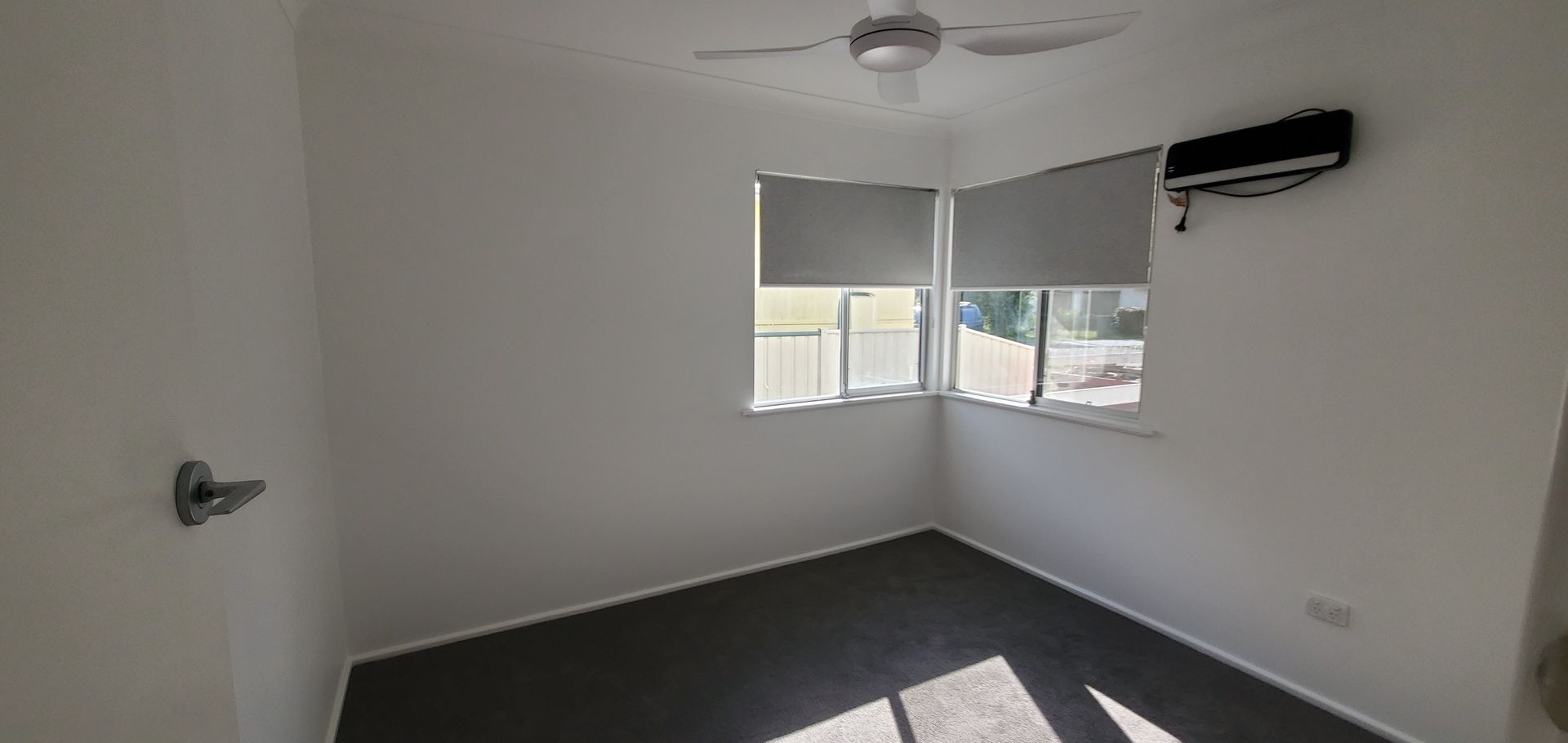 There is a ceiling fan in the corner of the room — JWP Painting & Property Services in Ettalong Beach, NSW