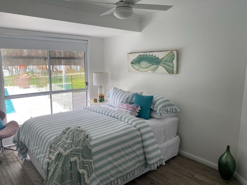 A Bedroom with a Bed — JWP Painting & Property Services in Ettalong Beach, NSW