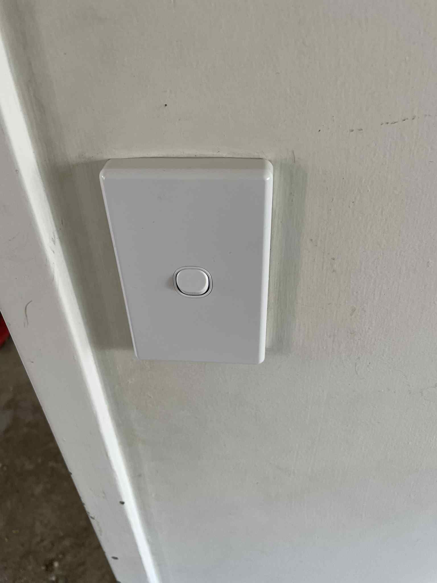 Dimmer switch for lounge room lighting, close-up view