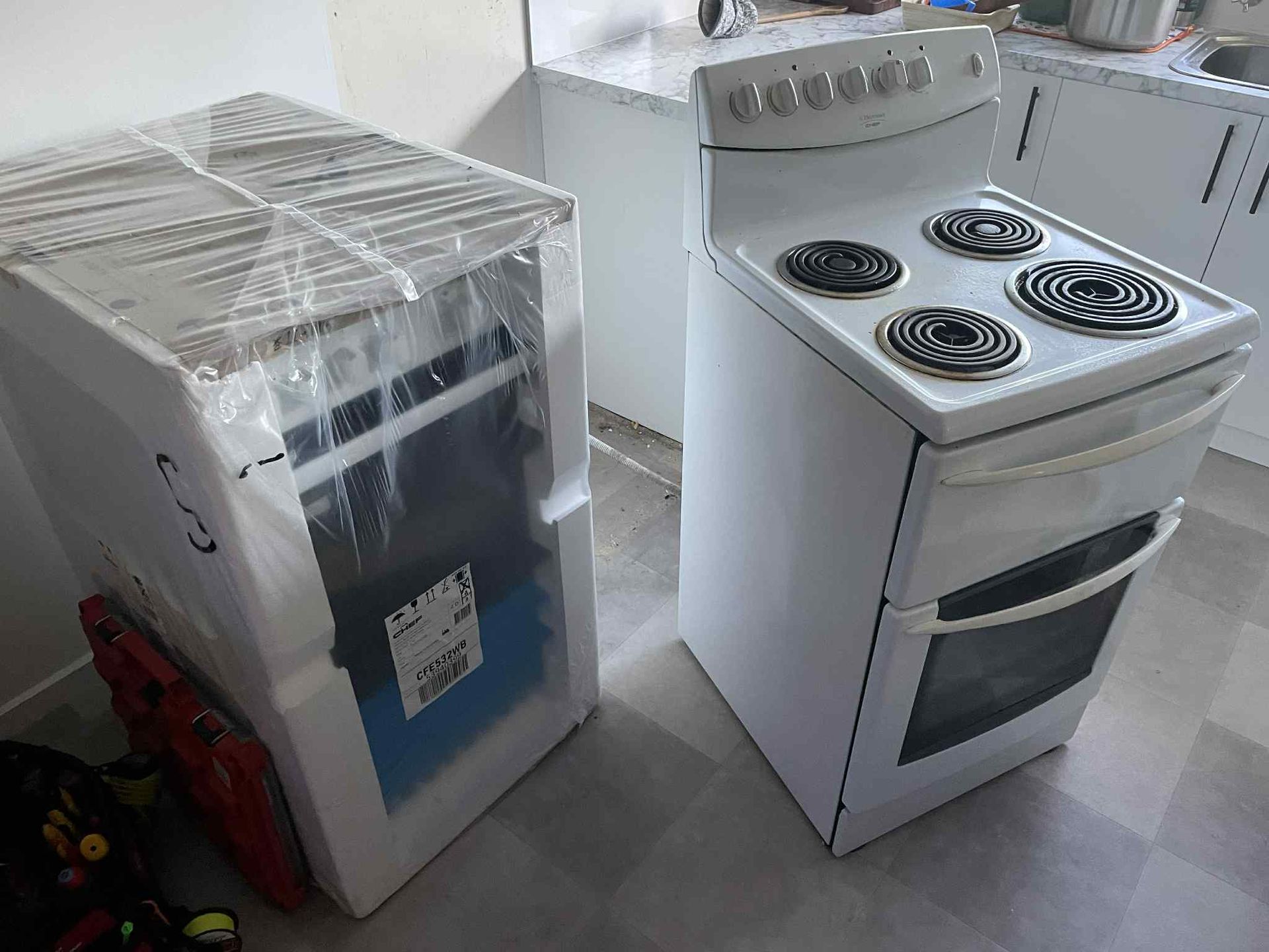 Built-in electric oven installed flush with kitchen cabinetry