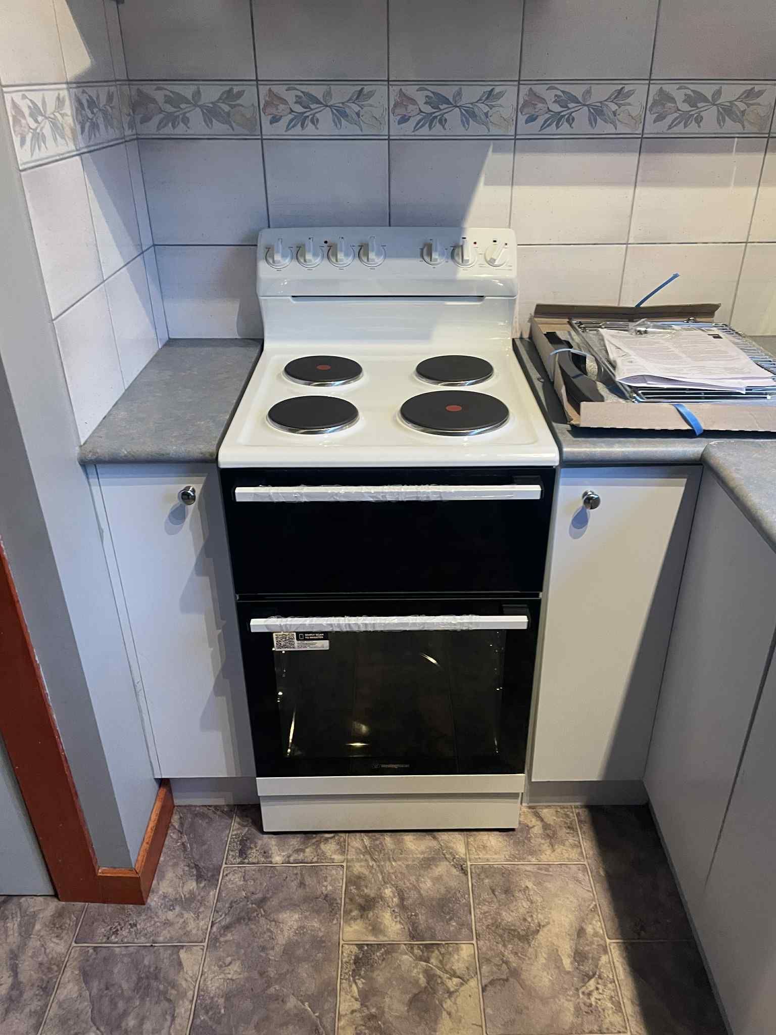 Modern electric oven installation completed by Ziesing Electrical