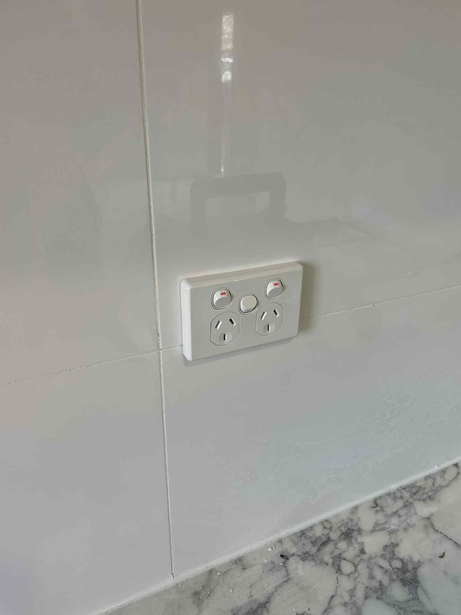 Modern electrical switchboard with labelled circuit breakers