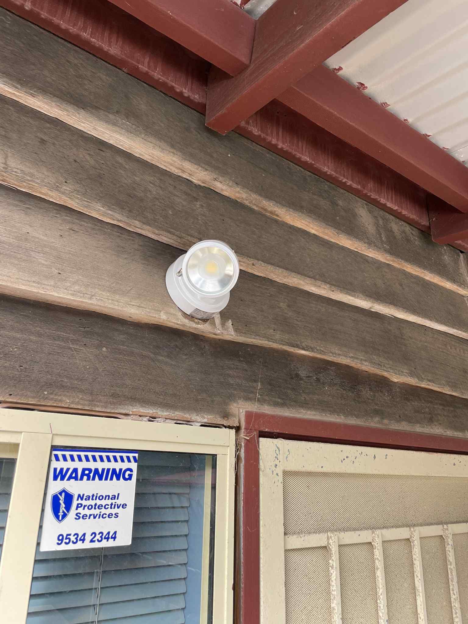 Patio string lights wired and tested in Brighton backyard — Ziesing Electrical