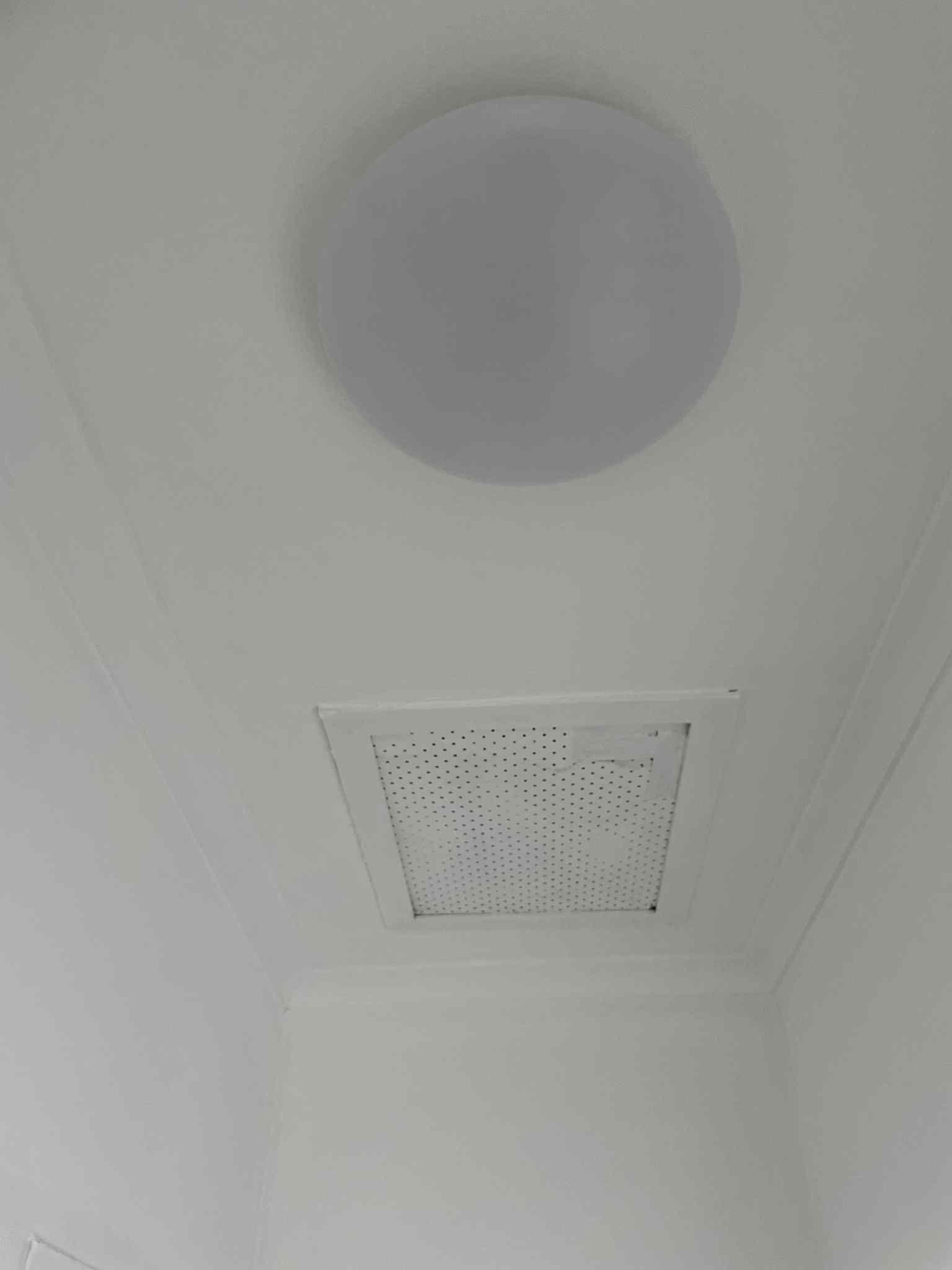 LED downlight being installed