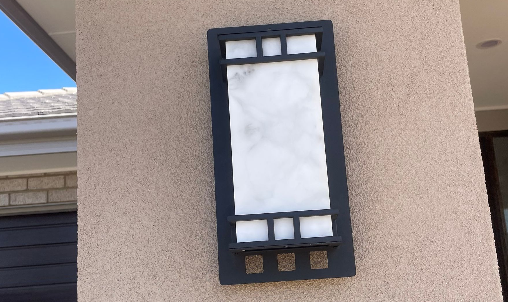 Residential light put on the wall of a building 