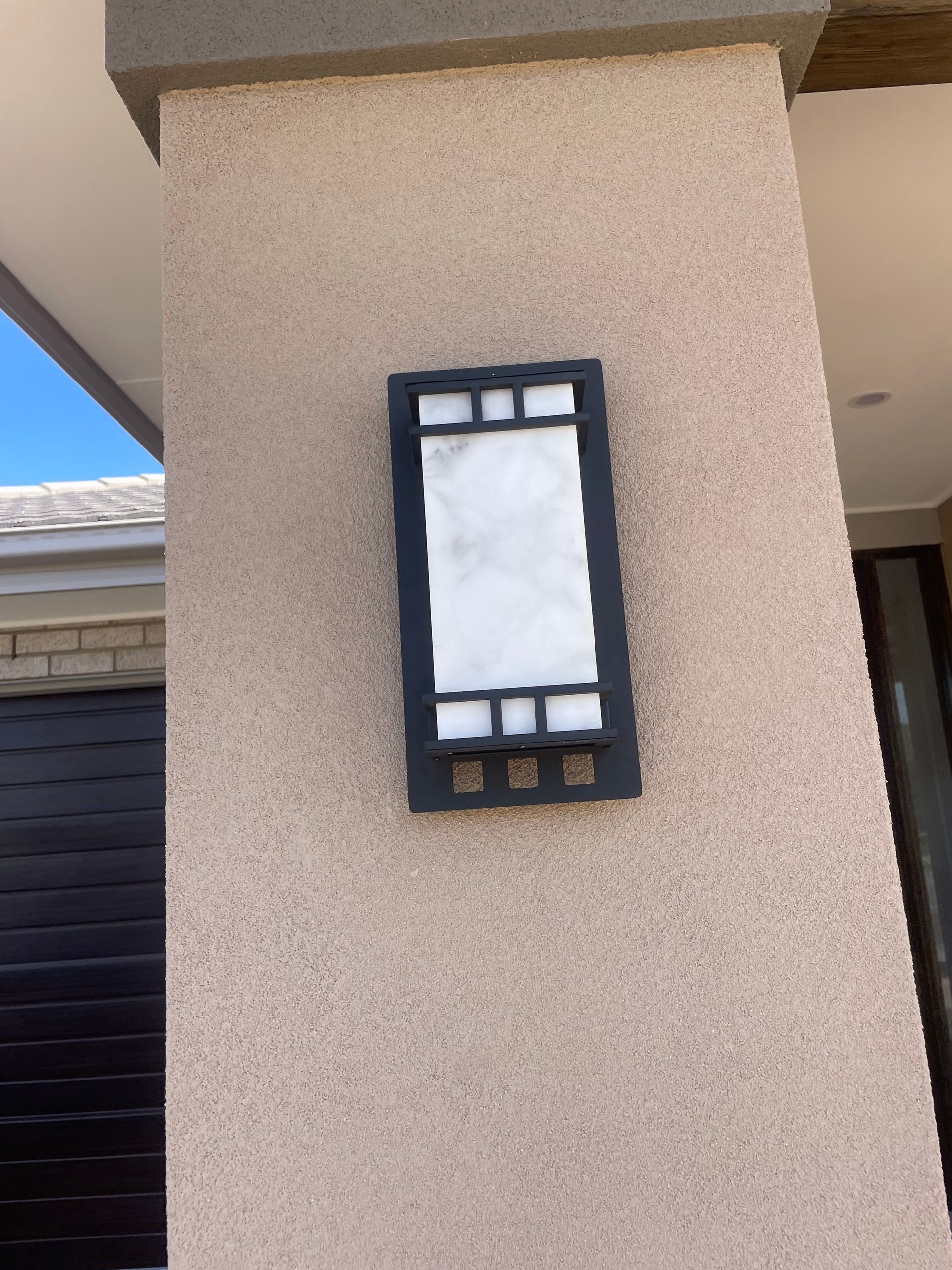 Awesome light mounted on the house wall outside