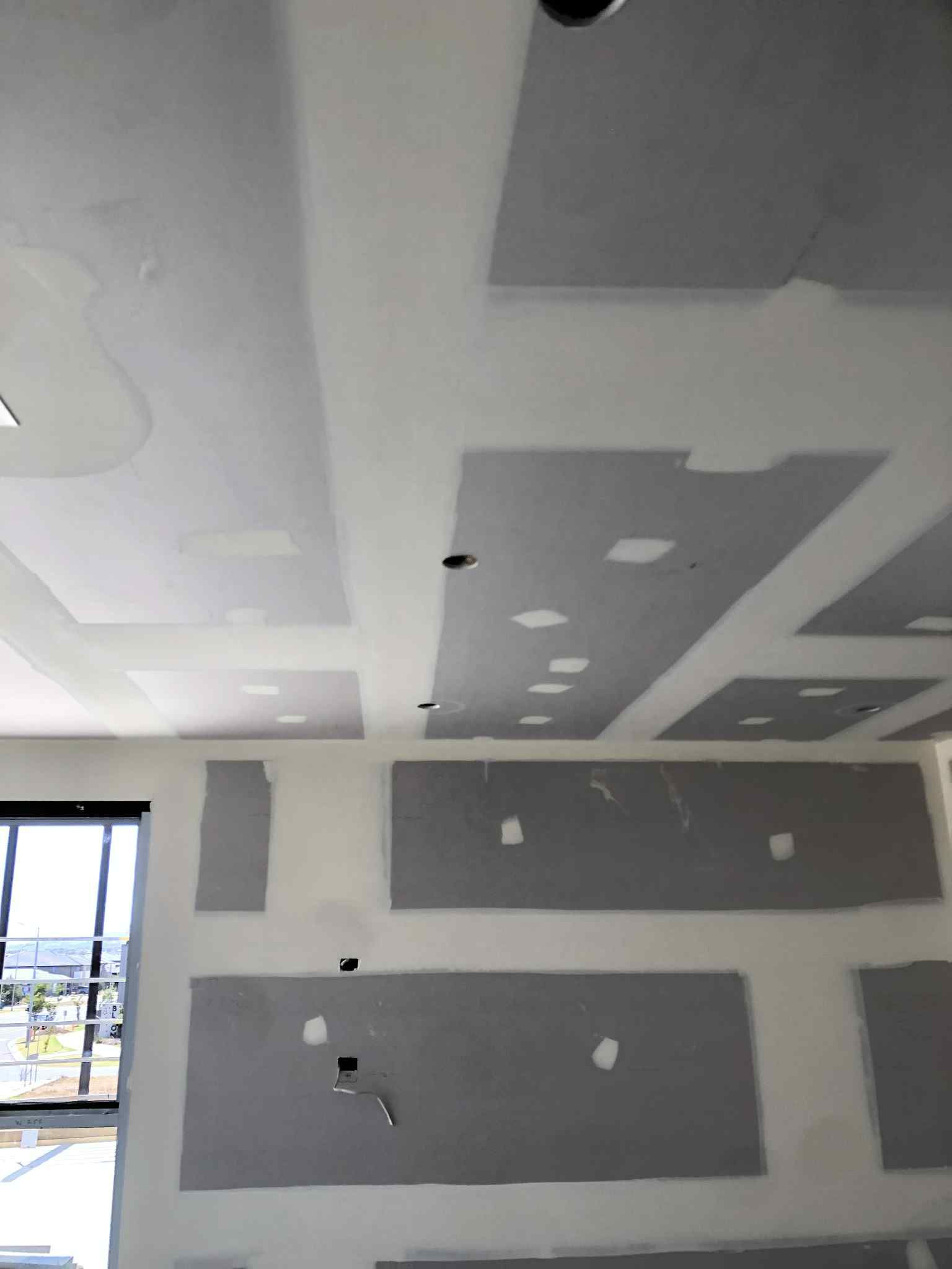 Modern Melbourne kitchen with pendant lights and recessed LED downlights installed by Ziesing Electrical