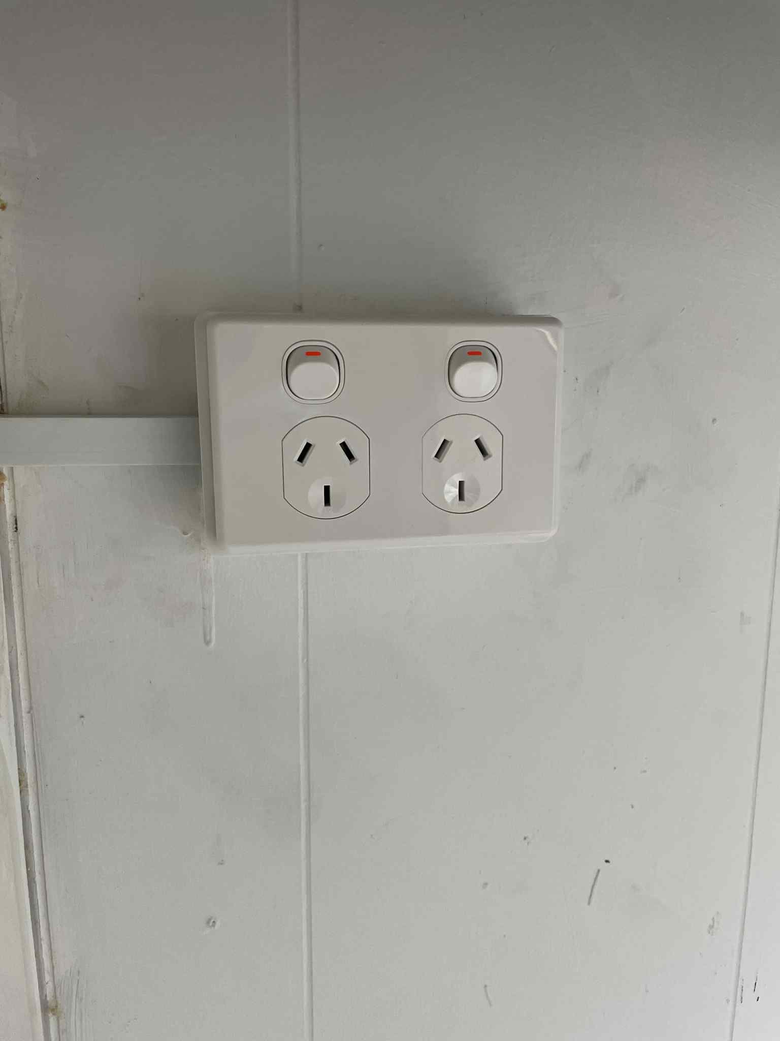 Ziesing Electrical installing new double power outlet on wall