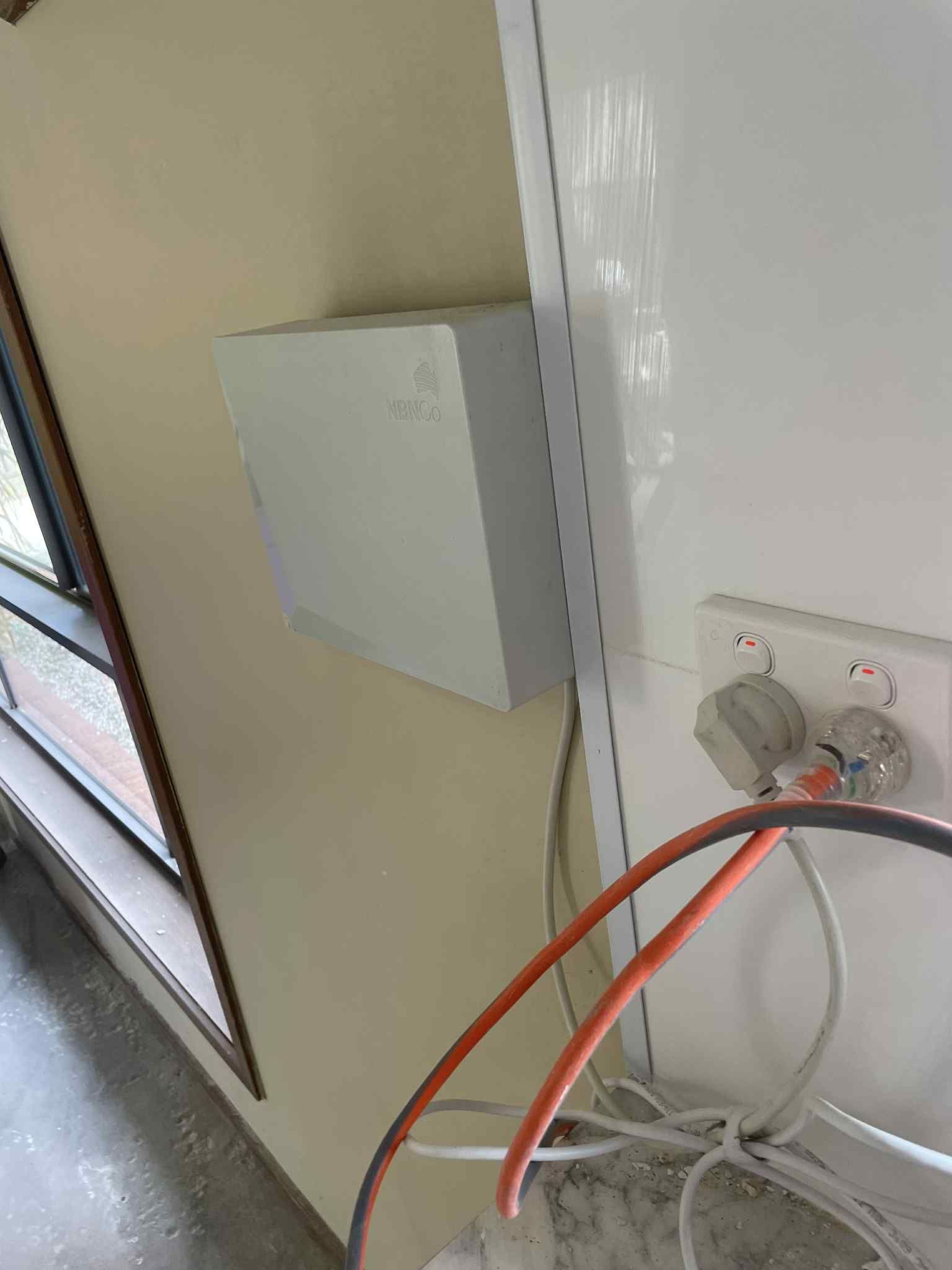 Ziesing Electrical technician inspecting residential switchboard