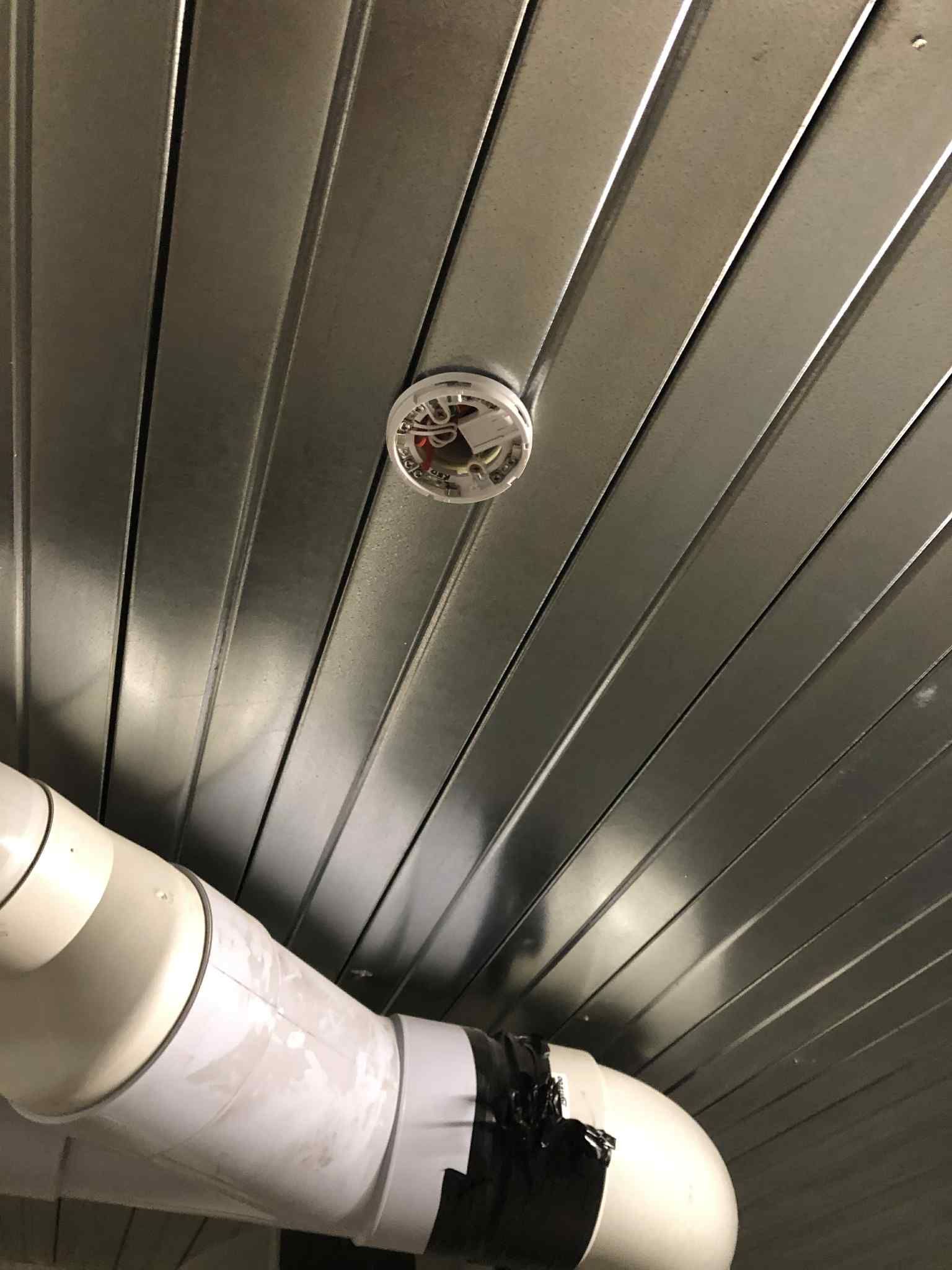 Ziesing Electrical: Recessed downlight housing installed in ceiling during kitchen lighting upgrade in Hampton.