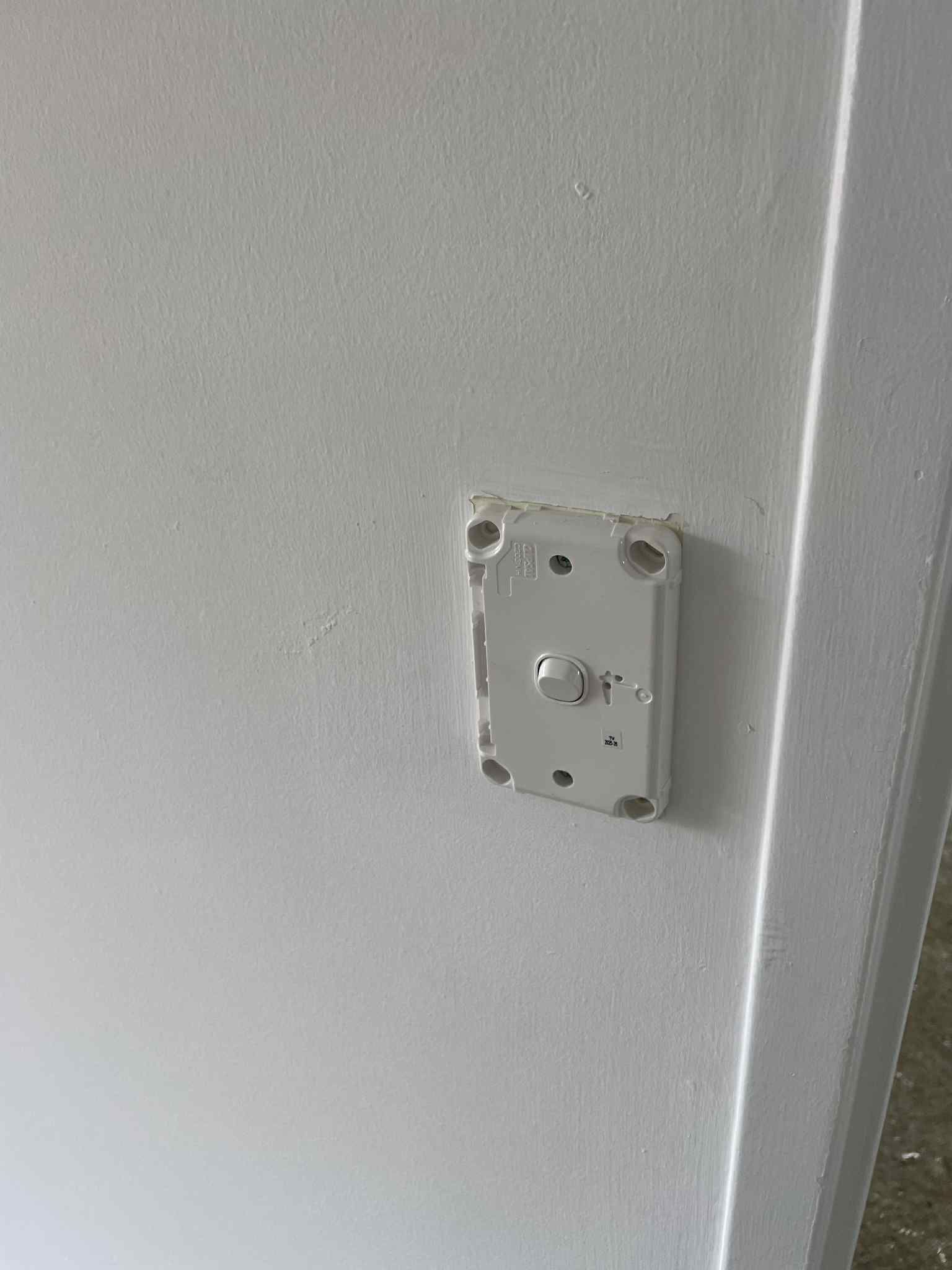 Downlight trim being clipped in