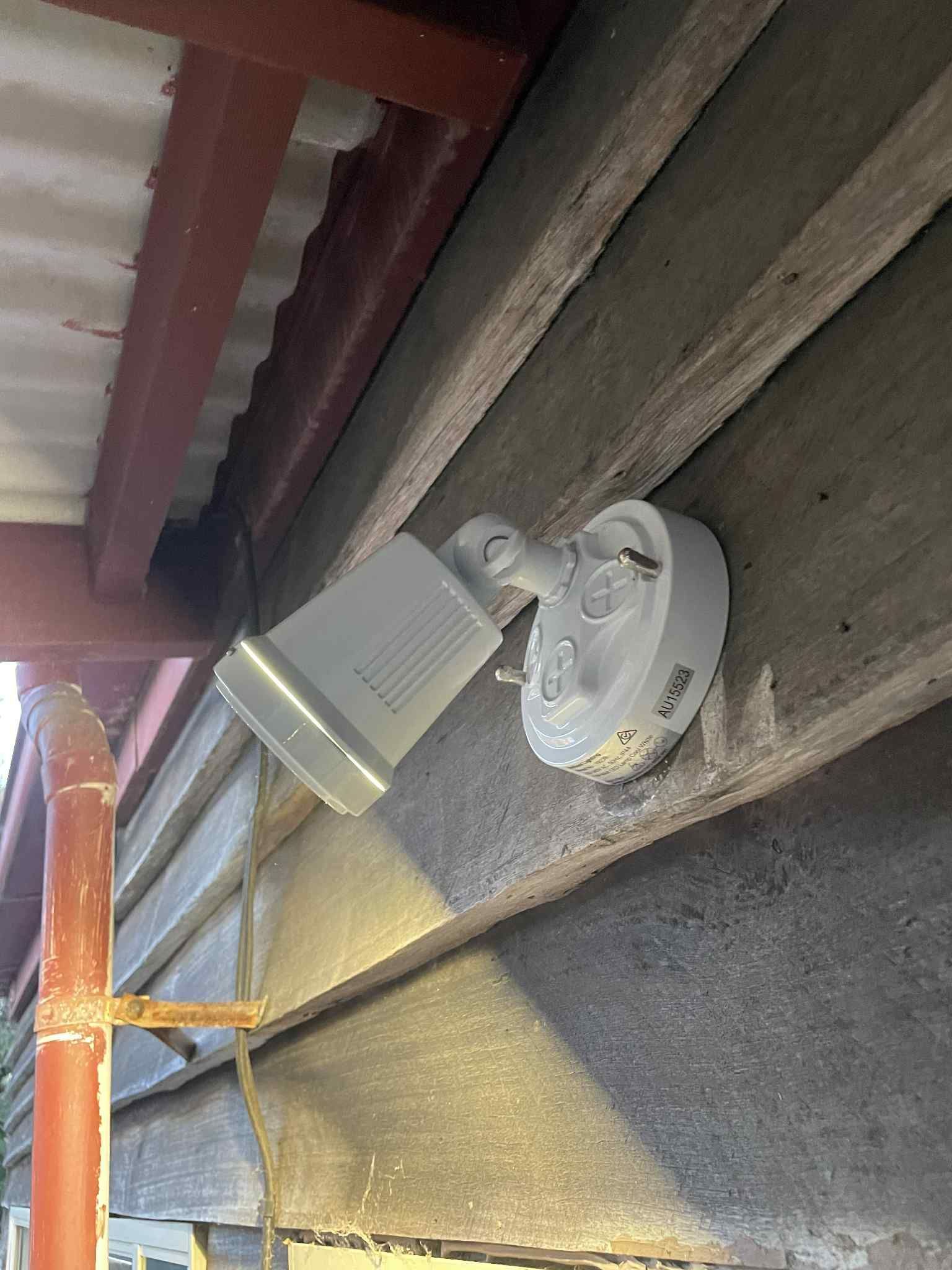 Patio string lights wired and tested in Brighton backyard — Ziesing Electrical