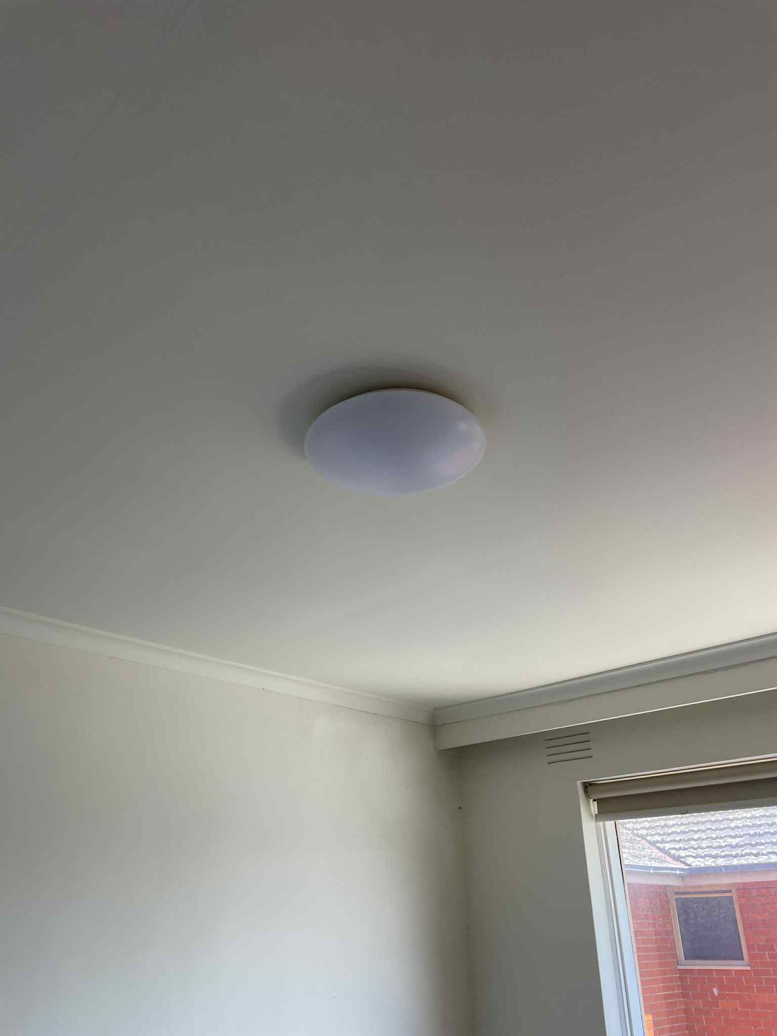 Flush-mounted downlight with soft white diffuser