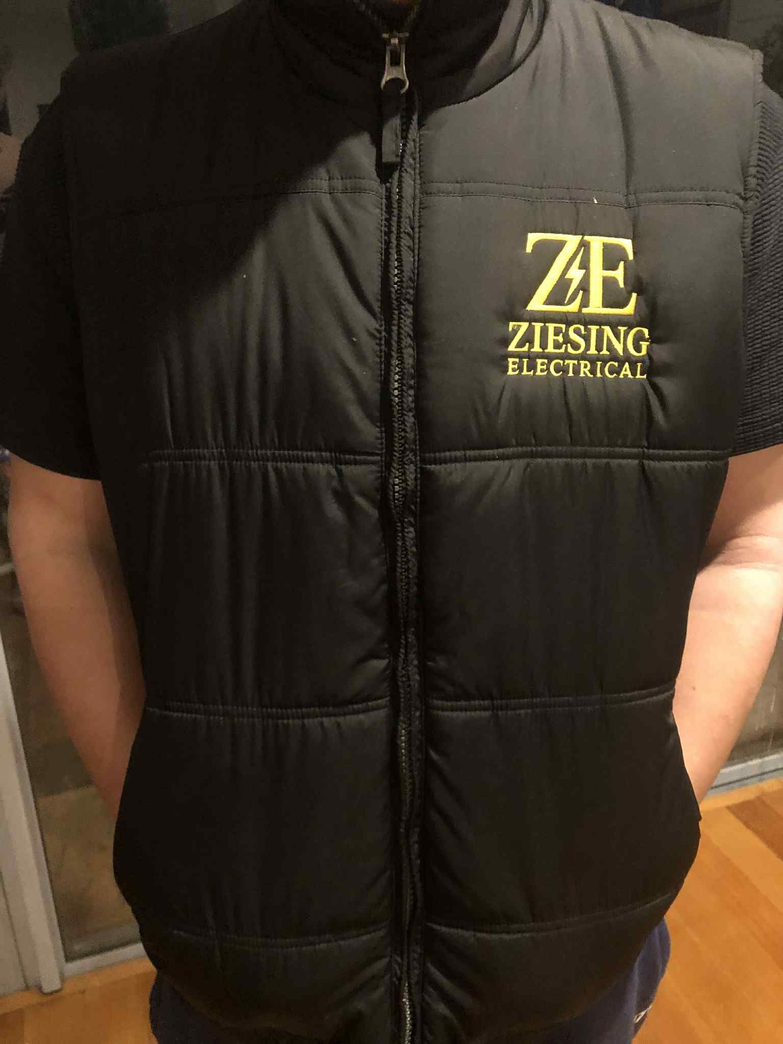 Ziesing electrical puffer vest worn when providing exceptional electrical services for residential, commercial, industrial 