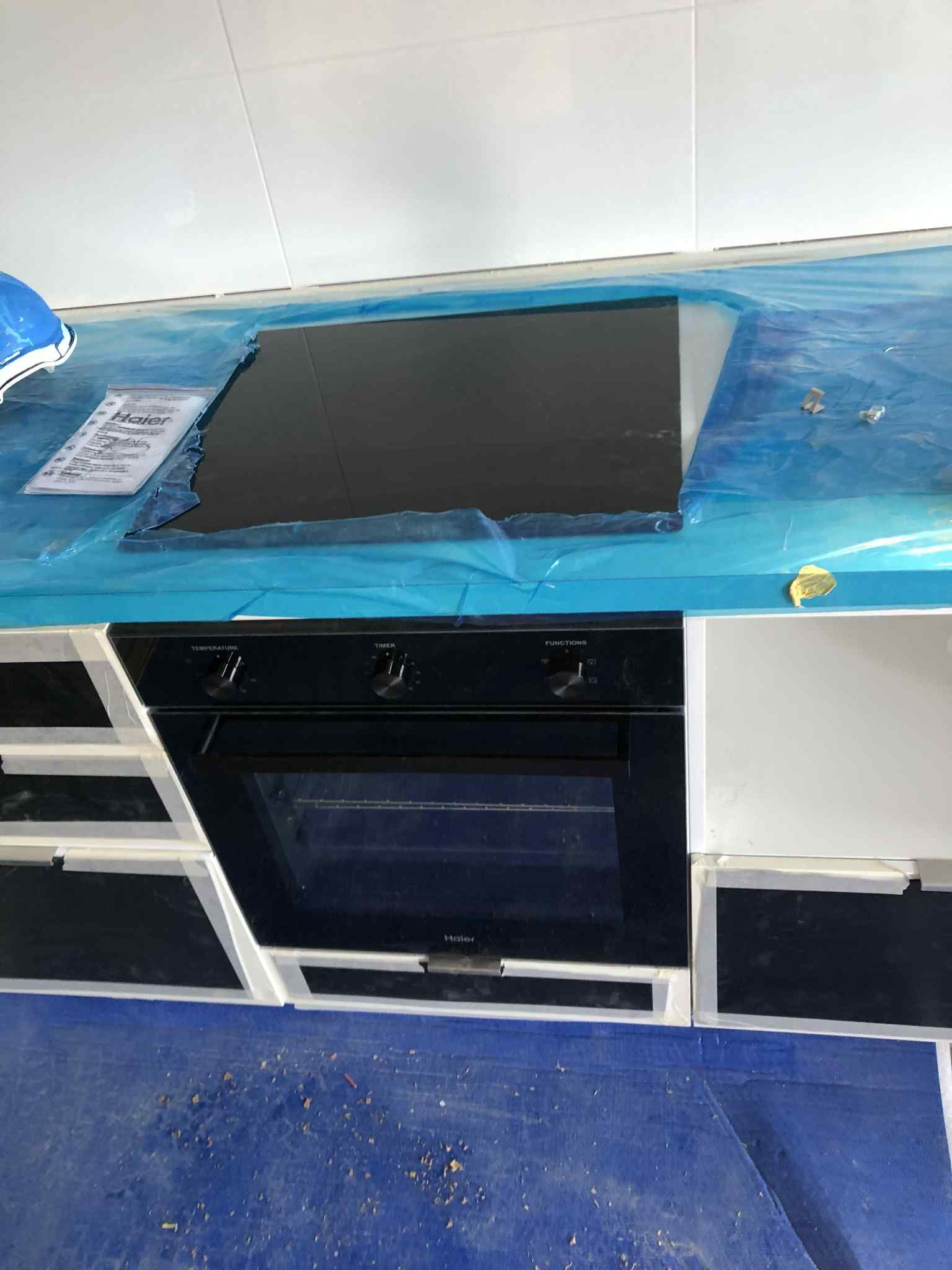 Kitchen appliance electrical installation — oven cavity and new wiring during kitchen fit-out in Melbourne.