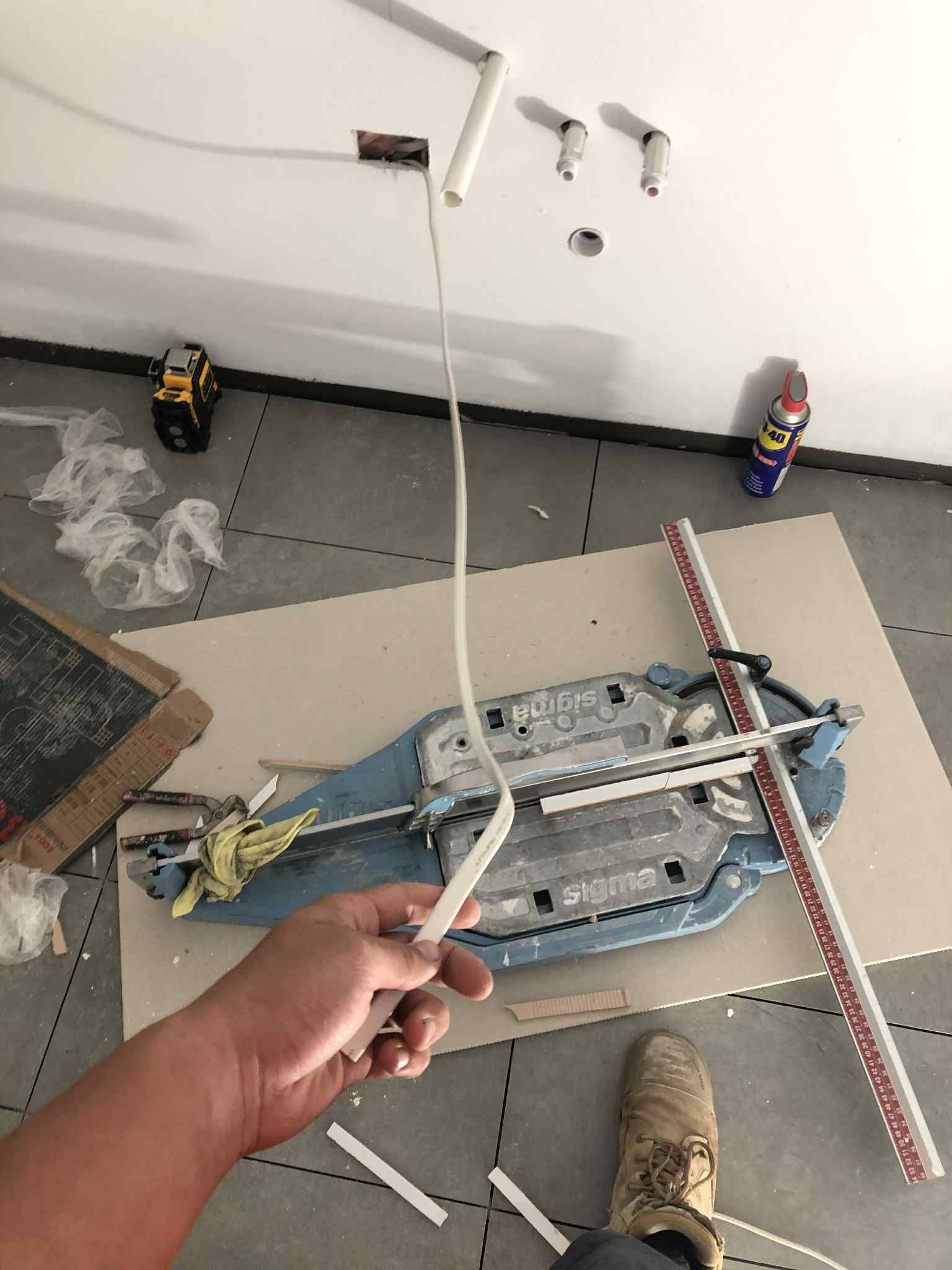 Ambient lighting setup in a modern kitchen with pendant lights and recessed LEDs