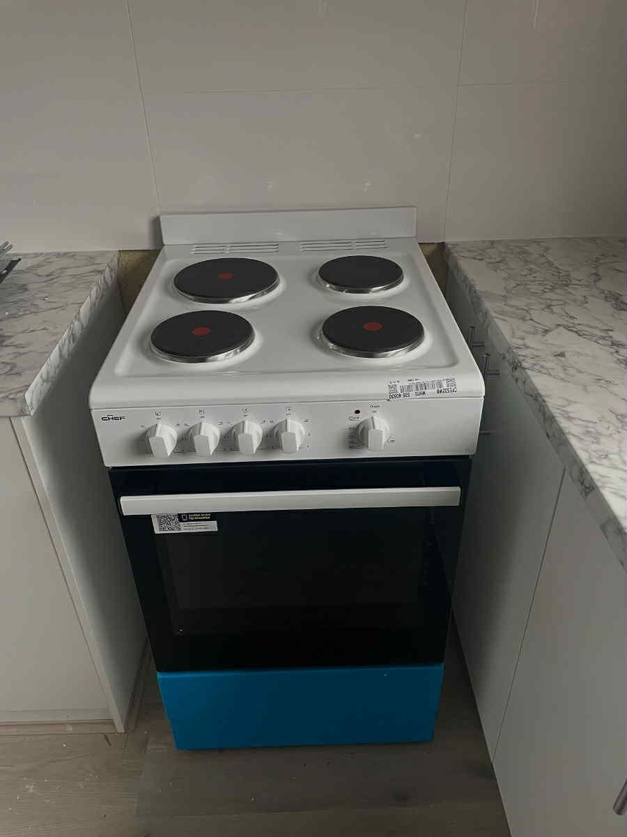 Oven installation — new appliance wired into kitchen circuit