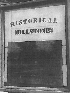 Black and White of Historical Millstones Sign