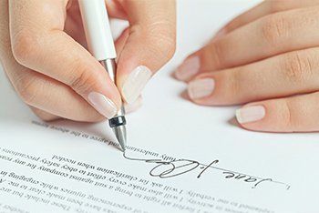 Business contract signing — Trust Litigation Attorneys in Austin, MN