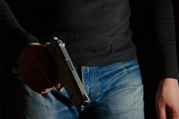 Danger man with a pistol comes — Trust Litigation Attorneys in Austin, MN