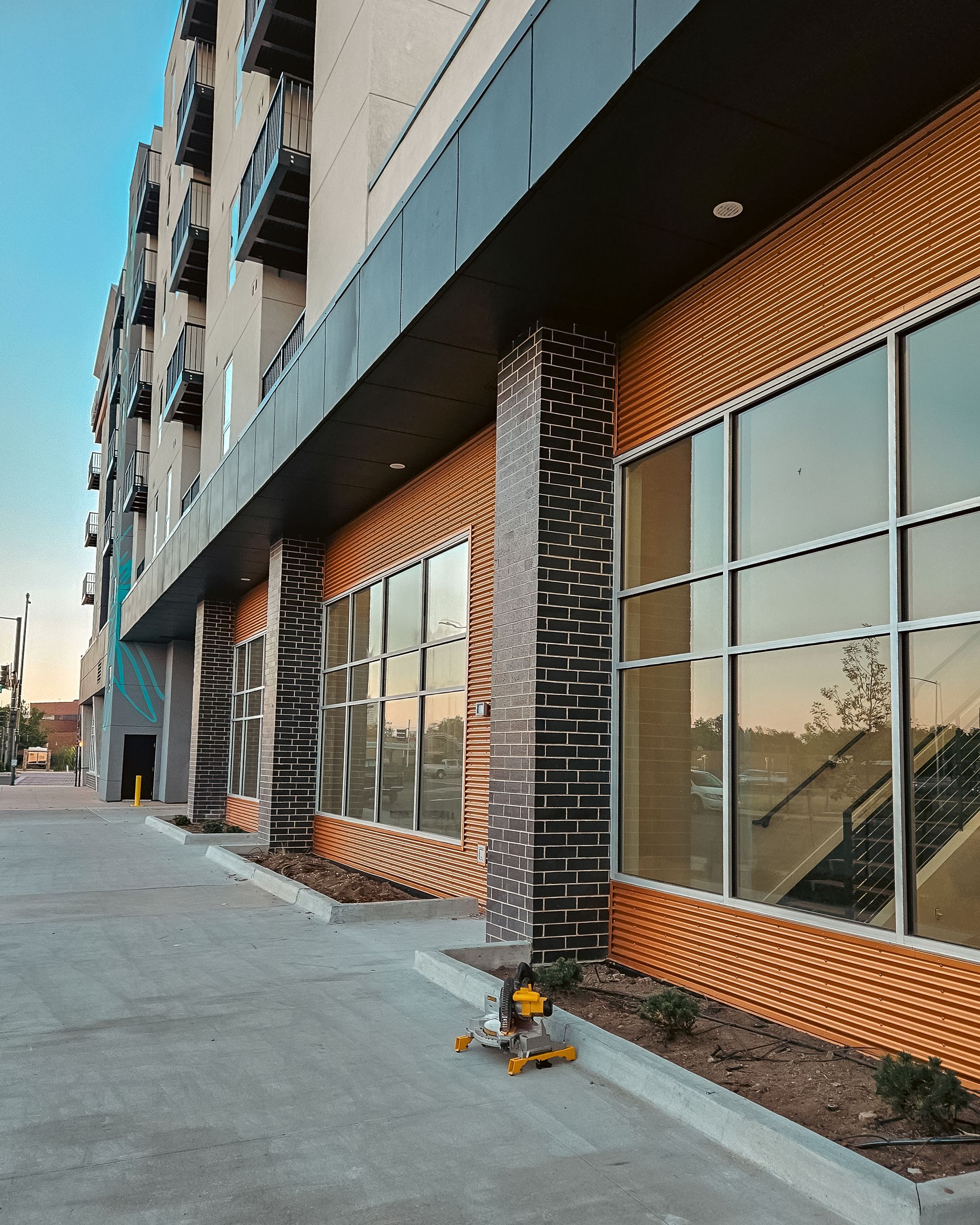 A large building with a lot of windows and stairs