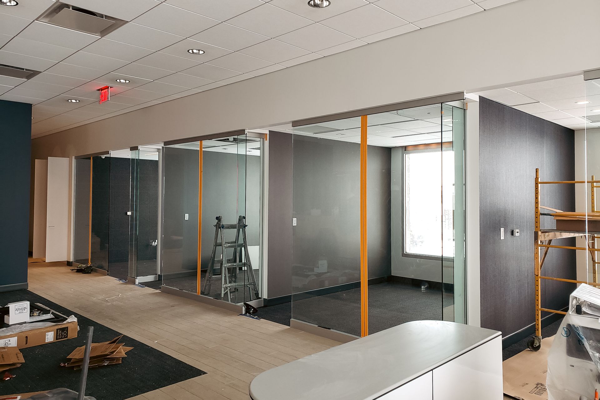 An empty room with a scaffolding in the middle of it