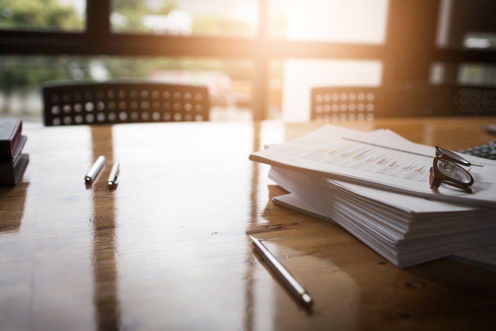 Attorney — Documents on Wooden Table in Miami Lakes, FL