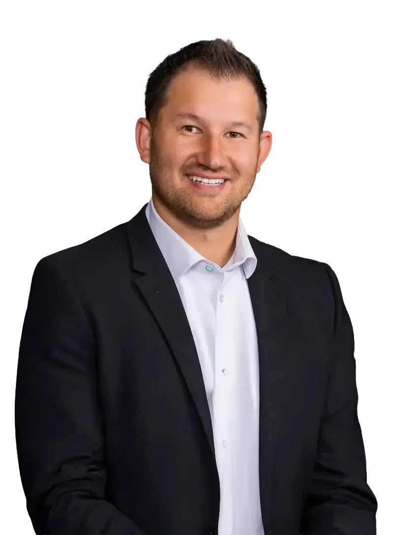 Mayur Dubai Mayur Dubai in a suit smiles, looking at the viewer. He has a beard and is against a transparent background.